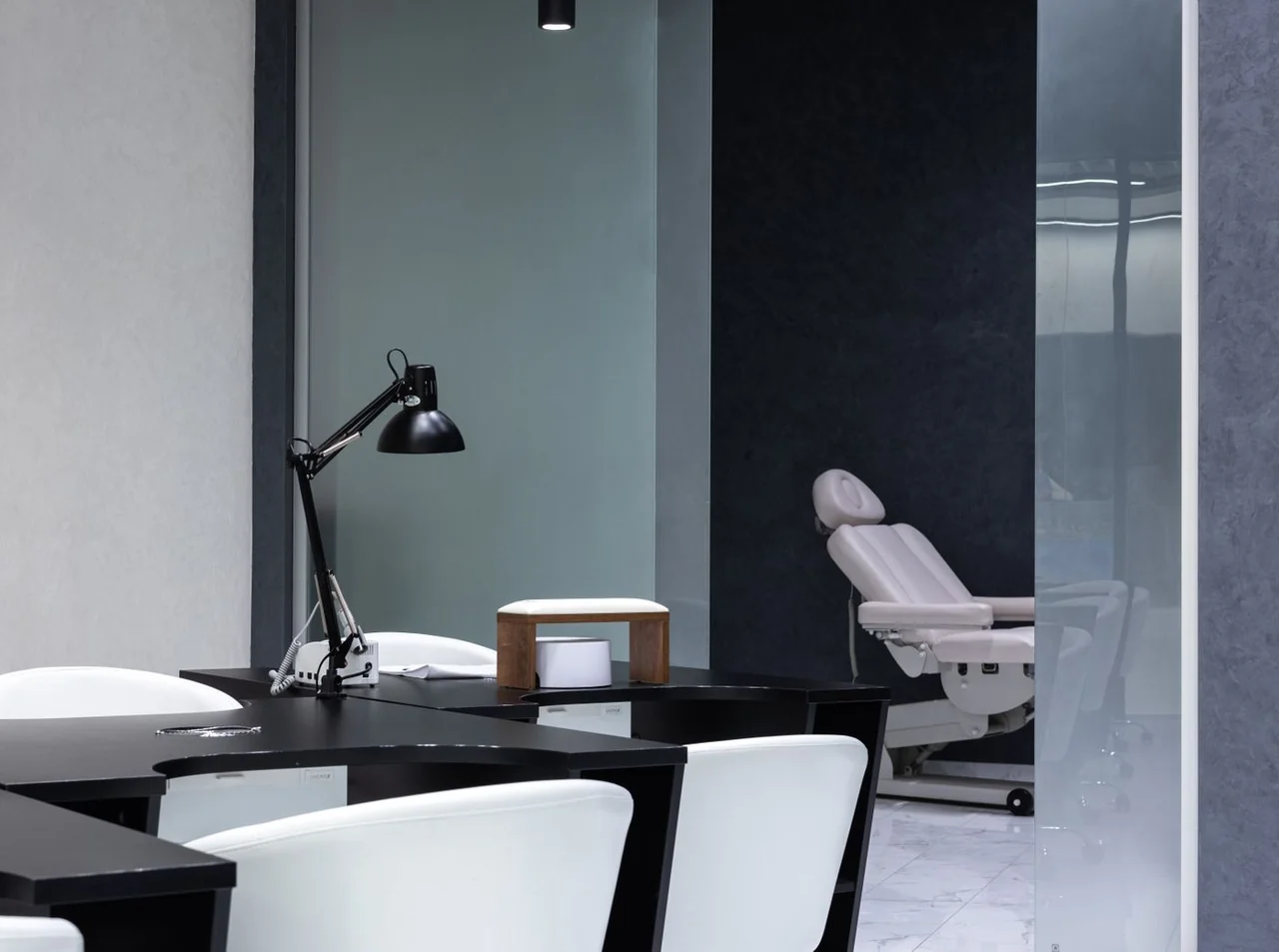 Sleek modern nail salon interior with tranquil service station