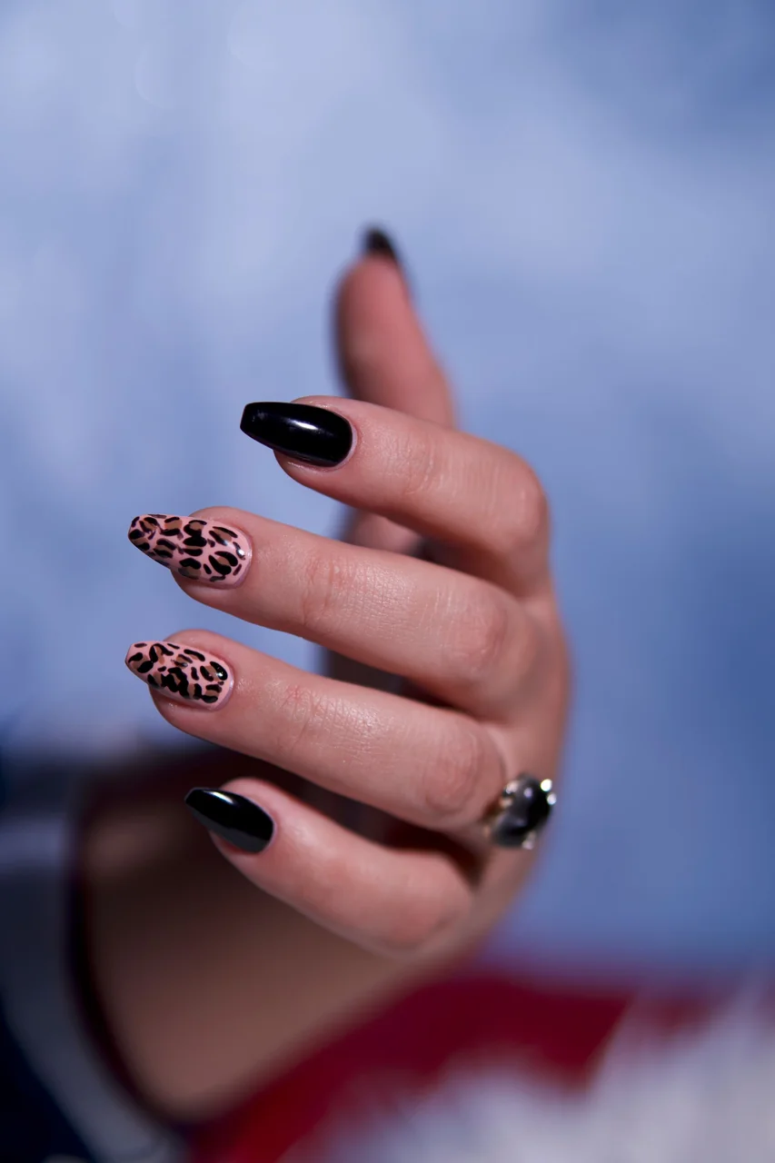 Hand painted custom nail art accents and geometric patterns