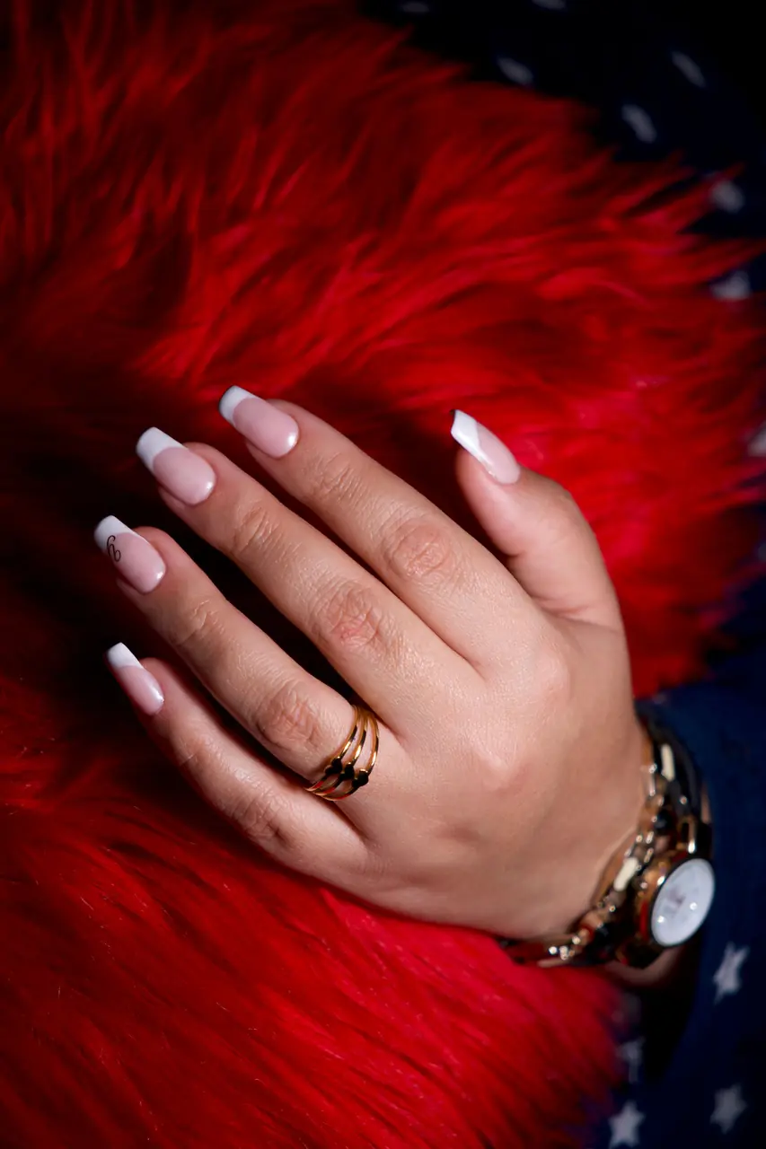 French manicure styling with subtle luxury details