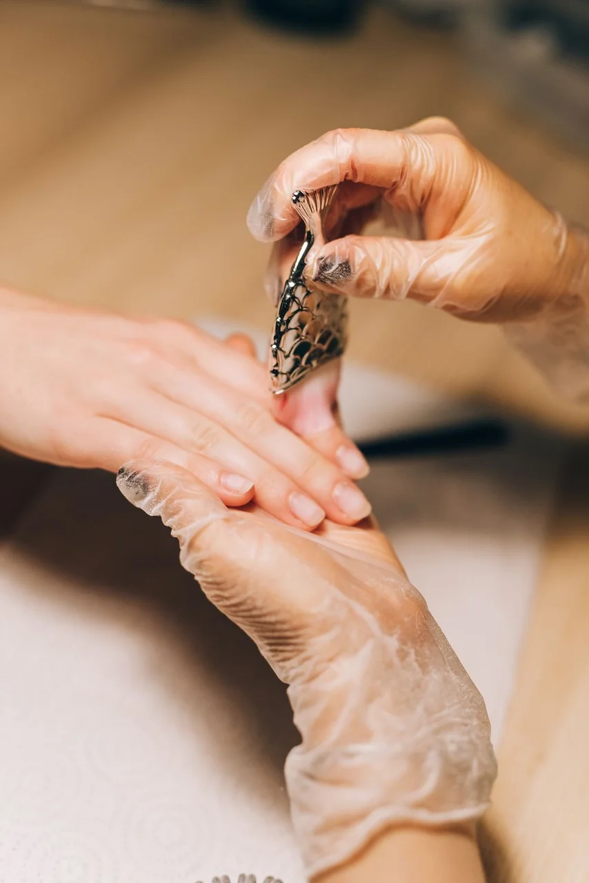 Hand-painted delicate nail artistry in progress