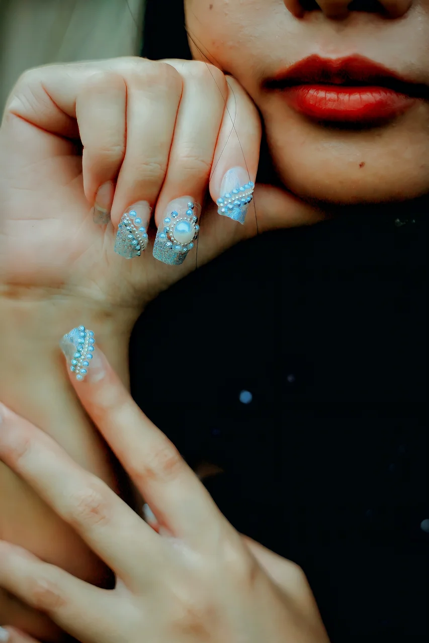 Finished elegant hands showcasing refined manicure gleam